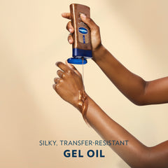 A person pours Vaseline Golden Hour Glow gel oil onto an arm