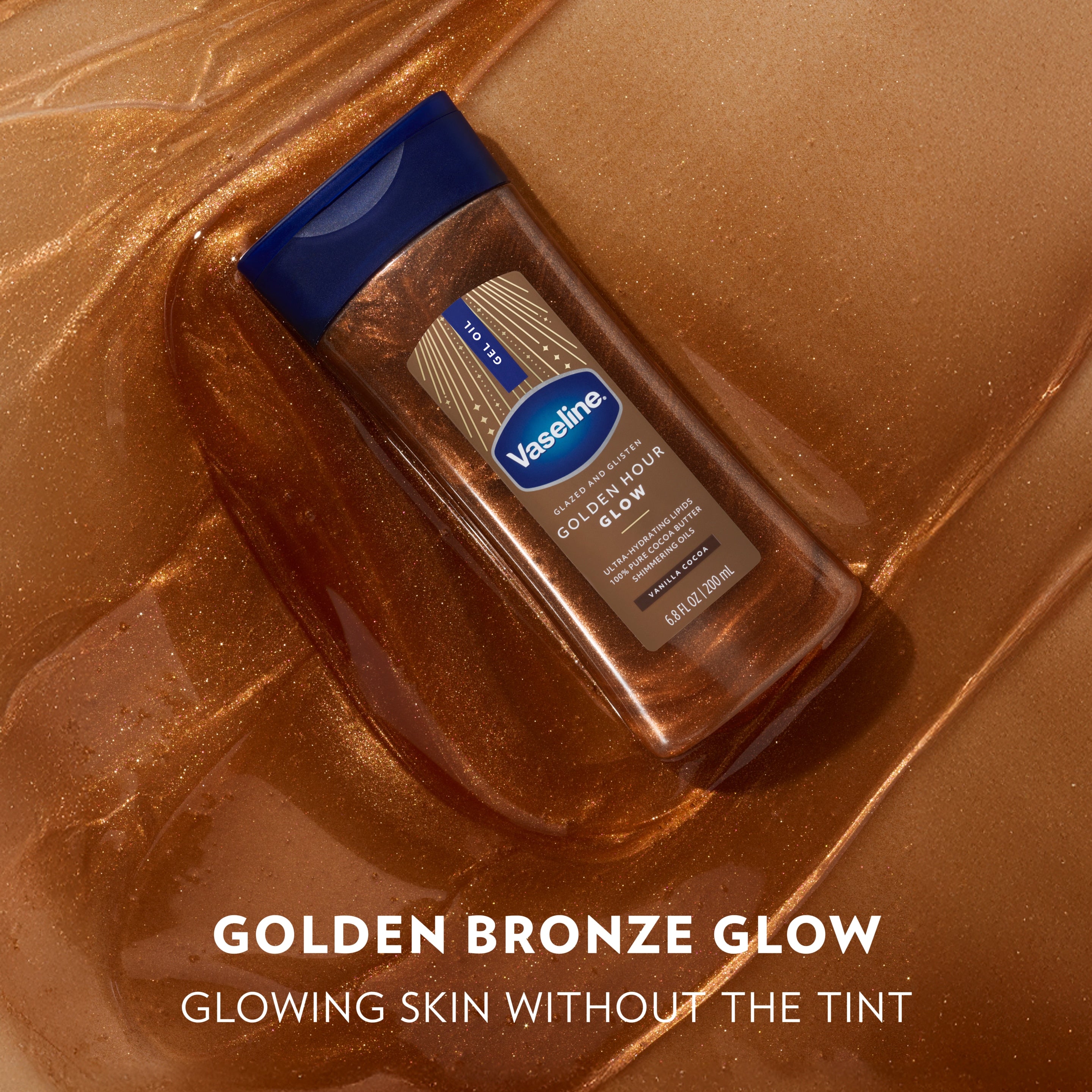 A bottle of Vaseline Golden Hour Glow gel oil lies on the product in the background beside text