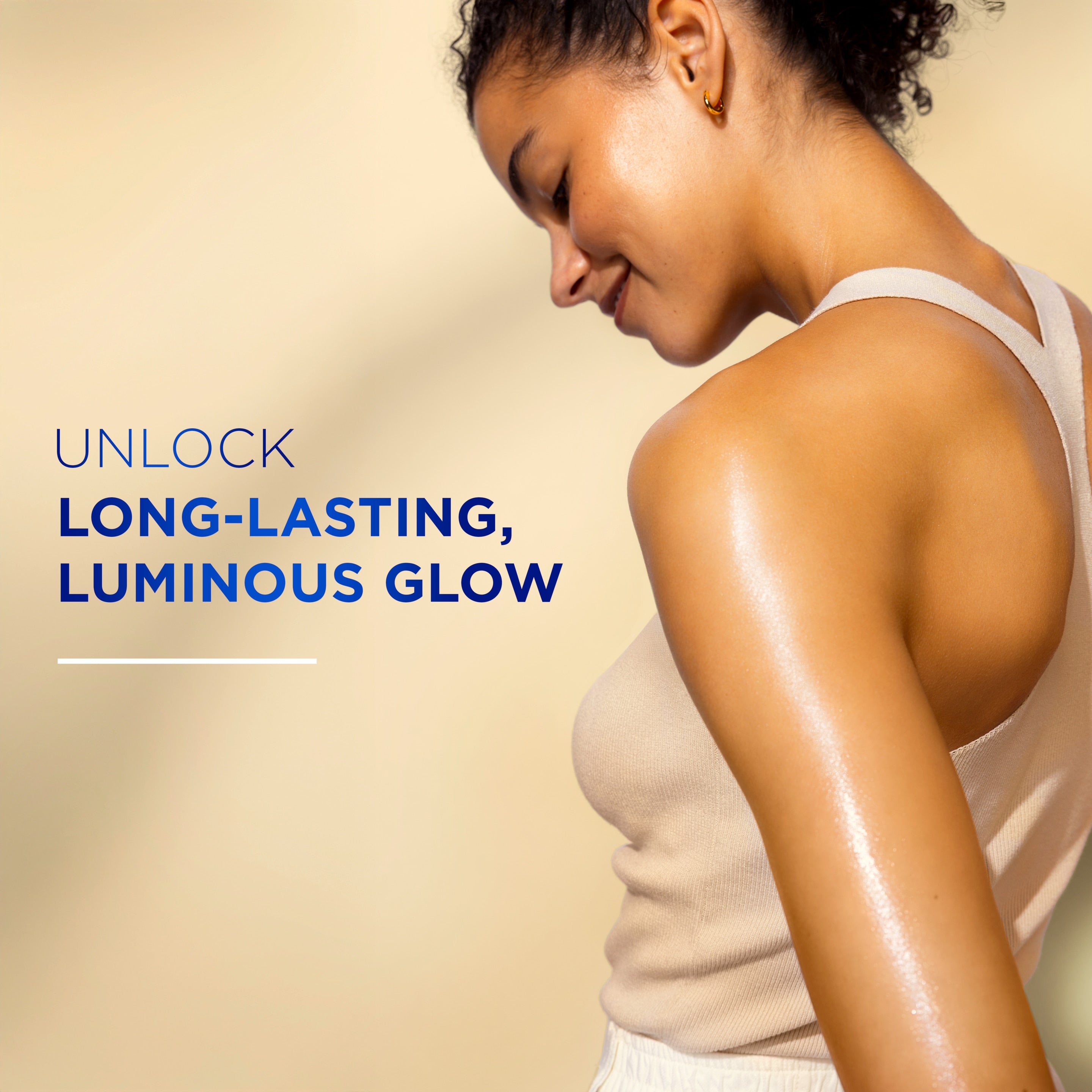 A person’s shoulder and upper arm are shown with a glossy, radiant finish beside text