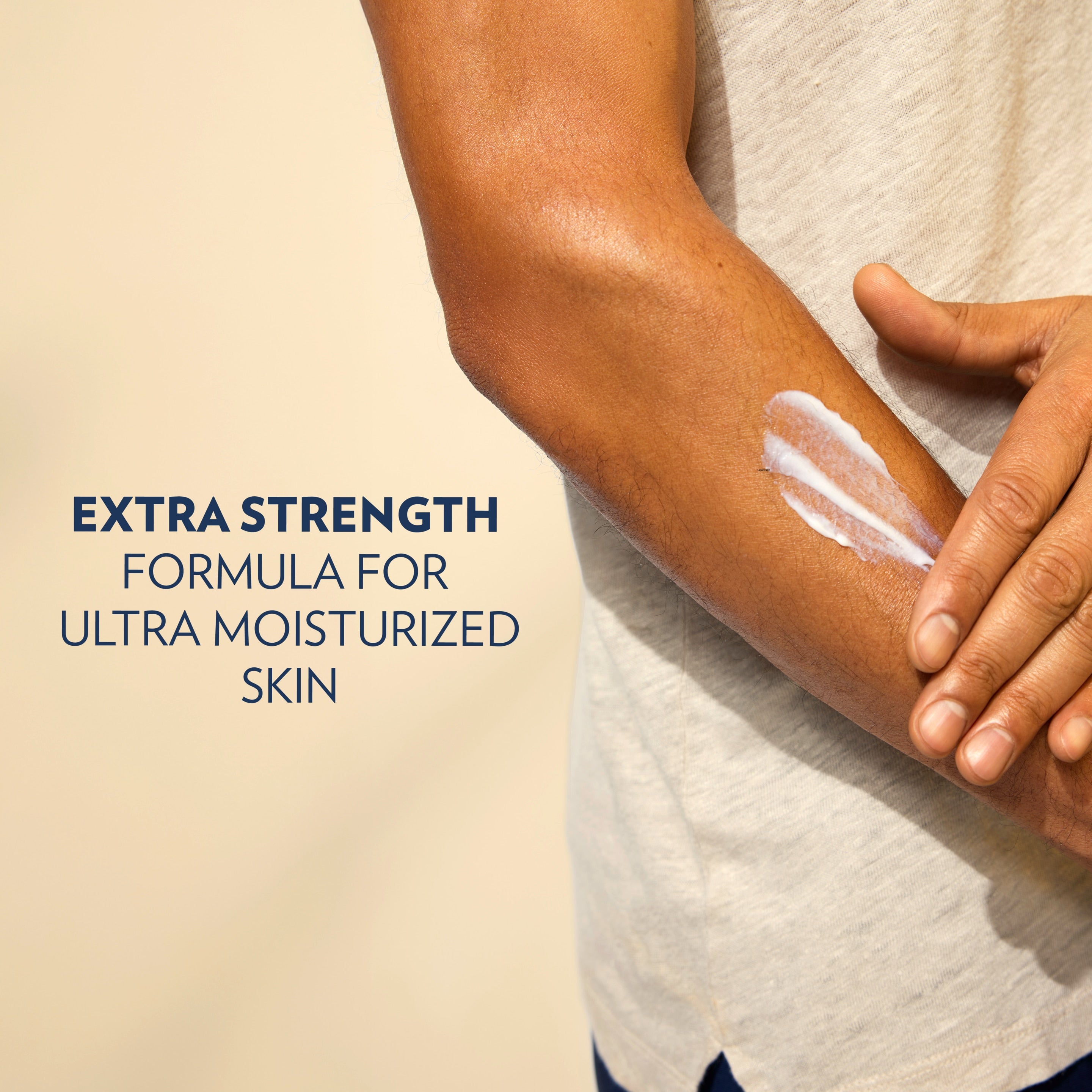 Vaseline Men Extrat Strength Lotion is being applied to an arm next to text
