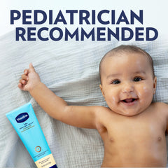 A Vaseline Baby Healing Jelly tube next to a baby lying on a light blanket, with text