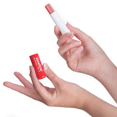 hands holding Vaseline® Lip Therapy® Rosy Lips Stick